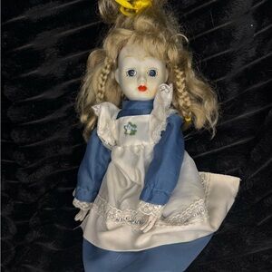 Blue Dress Porcelain Doll with White Apron and Braided Hair